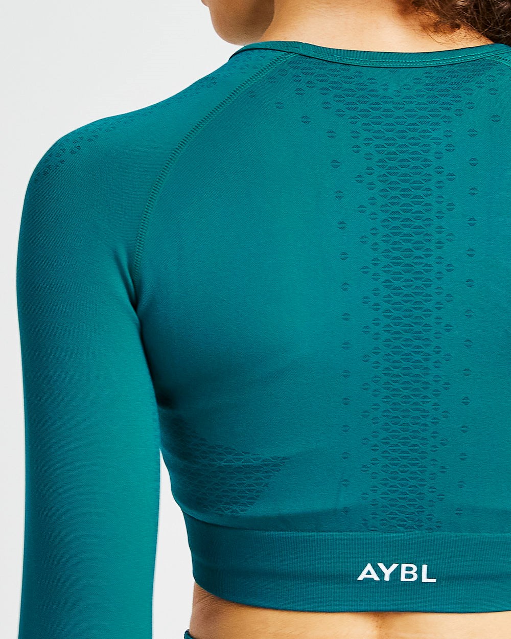 AYBL Ignite Seamless Long Sleeve Crop Top Hyper Teal | BDYNS7950