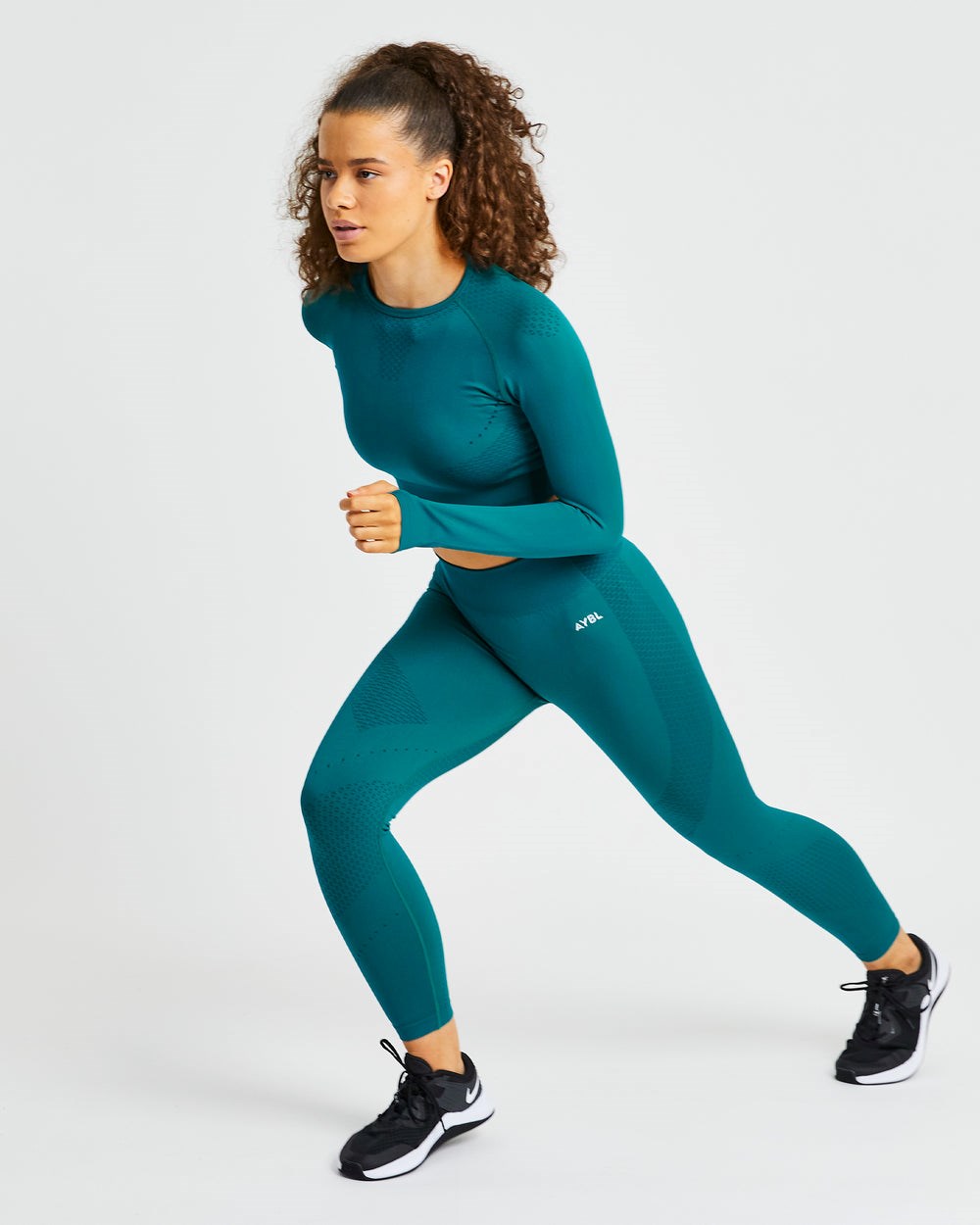 AYBL Ignite Seamless Long Sleeve Crop Top Hyper Teal | BDYNS7950