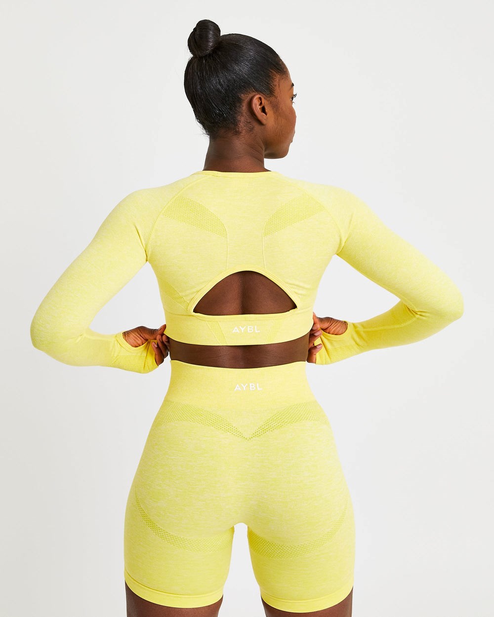 AYBL Motion Seamless Long Sleeve Crop Top Amarillo | CUBMV9376