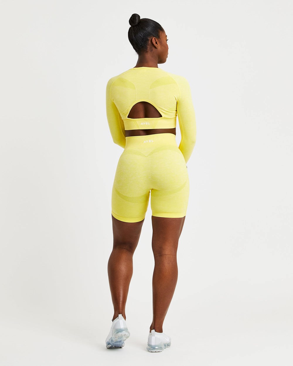 AYBL Motion Seamless Long Sleeve Crop Top Amarillo | CUBMV9376