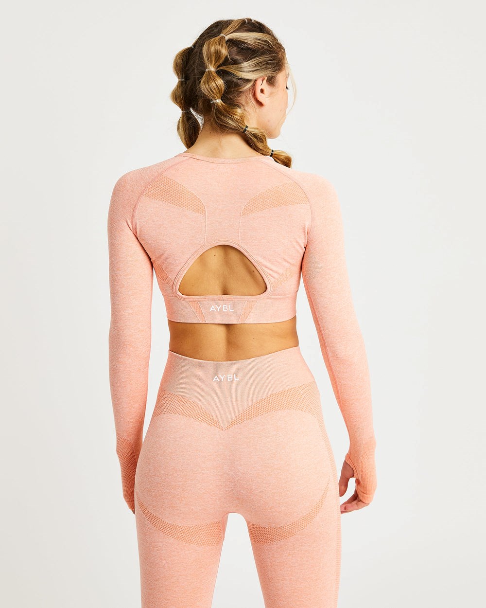 AYBL Motion Seamless Long Sleeve Crop Top Peach Marl | ZGSWD9851