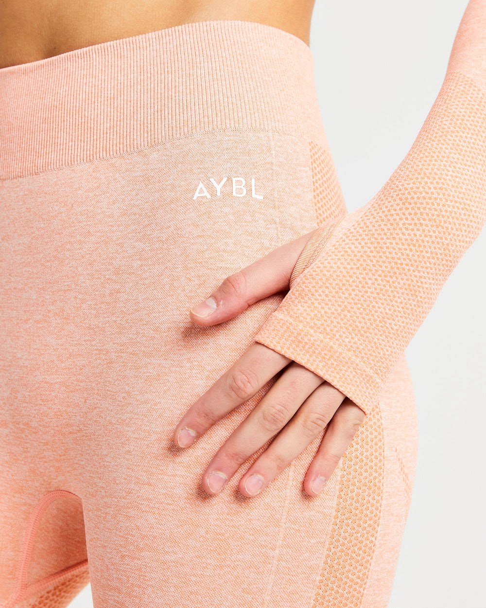 AYBL Motion Seamless Long Sleeve Crop Top Peach Marl | ZGSWD9851